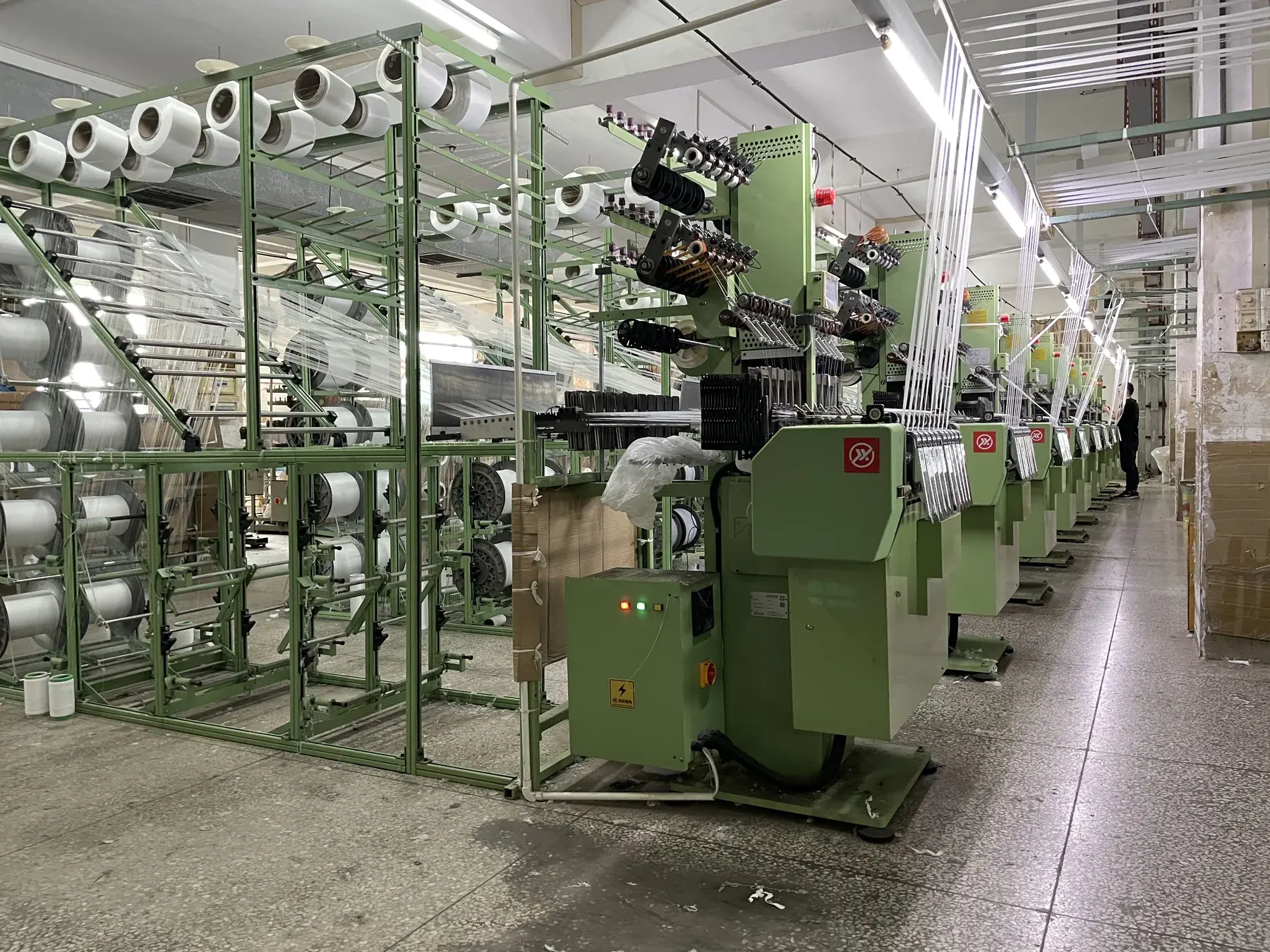 Huagui shuttleless loom workshop for elastic webbing